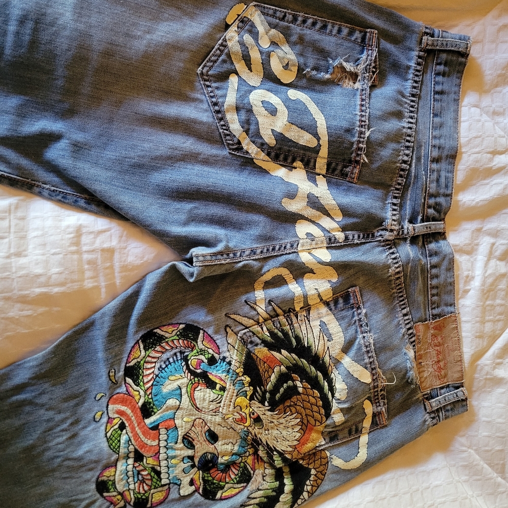 Ed Hardy distressed, embroidered, and painted button up jeans.